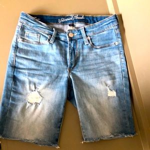 DISTRESSED BERMUDA DENIM SHORTS